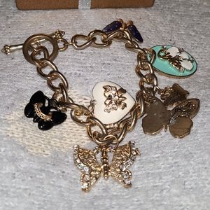 Juicy Couture gold butterfly charm bracelet